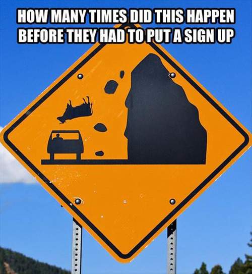 Road sign - Cow falling from the hill