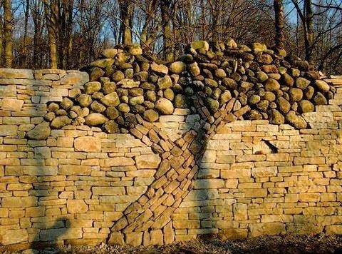 Tree in wall made of rocks 