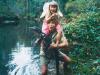 Steve Irwin his daughter, and a crocodile.